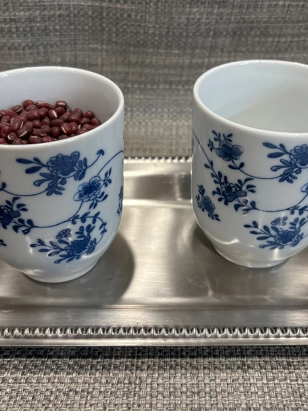 practical life pouring 1:1 w/floral tumblers ceramic by idlewild montessori